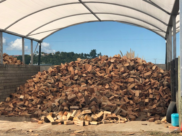 Dry firewood kept under cover at Treewise Whangarei